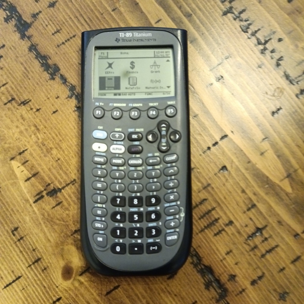 Texas Instruments TI-89 Titanium Graphing Calculator WORKS No battery cover gd